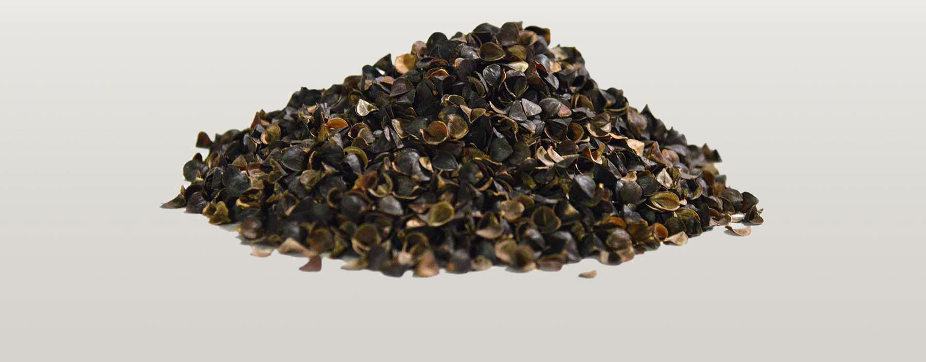 Close-up photograph of premium buckwheat hulls - intact, not crumbled